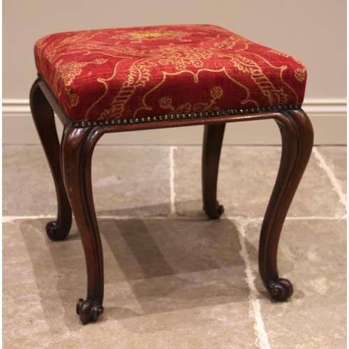 985 - A 19th century mahogany footstool, the upholstered red damask seat, upon French cabriole legs extend... 