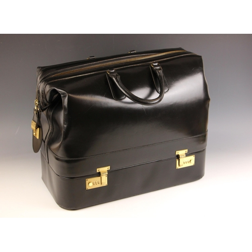 656 - A Swaine Adeney Brigg black leather two section locking bottom weekender bag, 49cm W x 26cm D x 38cm... 