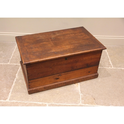 966 - A Victorian pine blanket chest/trunk, applied with iron swing handles, upon a moulded plinth base, 4... 