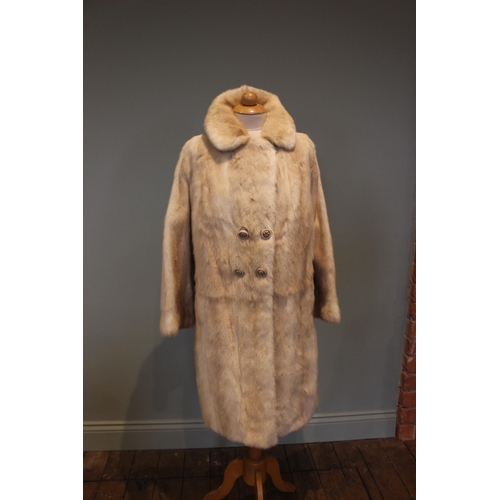 663 - A champagne mink double breasted fur coat, labelled for Continental Furs of Blackpool, size medium, ... 