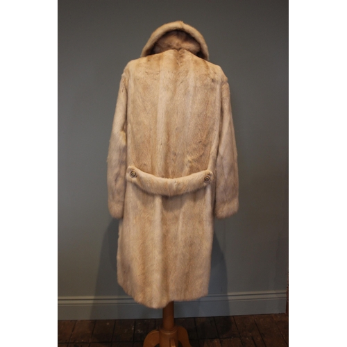 663 - A champagne mink double breasted fur coat, labelled for Continental Furs of Blackpool, size medium, ... 