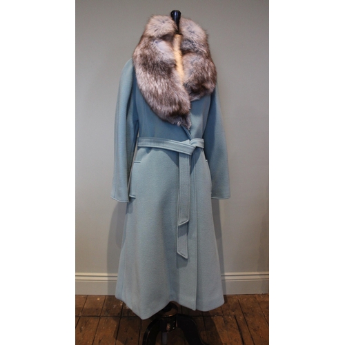 664 - A 1970s vintage wool Melton cloth pale blue coat with dyed fox collar, size medium, 118cm long