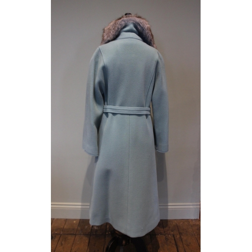 664 - A 1970s vintage wool Melton cloth pale blue coat with dyed fox collar, size medium, 118cm long