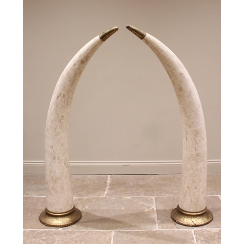 516 - A large pair of simulated elephant tusks, Indian, mid 20th century, each applied with camel bone til... 