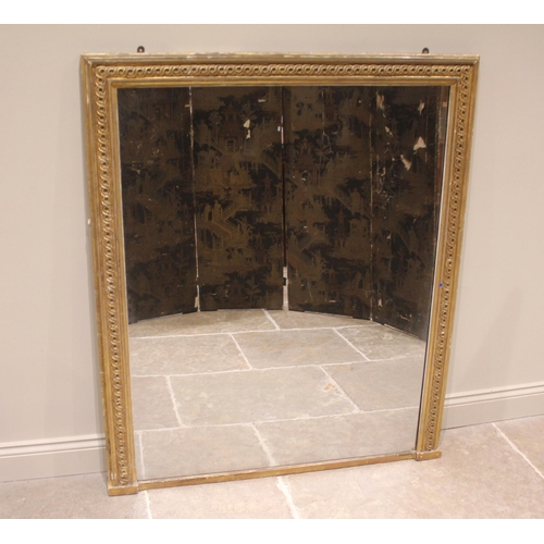 797 - A Victorian giltwood and gesso overmantel wall mirror, the single mirror plate enclosed within a gil... 