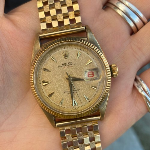 157 - A mid 20th century 9ct Rolex Oyster Perpetual Datejust 'Red' wristwatch, ref: 6305, the circular pat... 