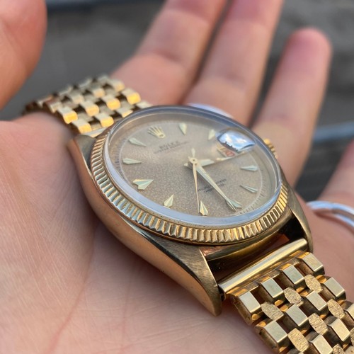 157 - A mid 20th century 9ct Rolex Oyster Perpetual Datejust 'Red' wristwatch, ref: 6305, the circular pat... 