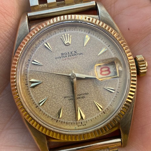 157 - A mid 20th century 9ct Rolex Oyster Perpetual Datejust 'Red' wristwatch, ref: 6305, the circular pat... 