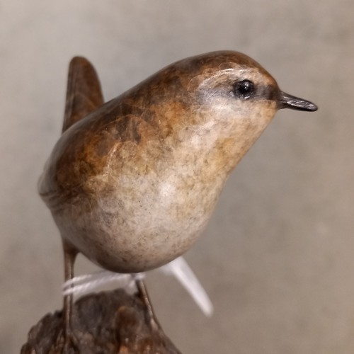 387 - Eddie Hallam (modern British), a limited edition bronze model of a wren perched upon a rocky outcrop... 