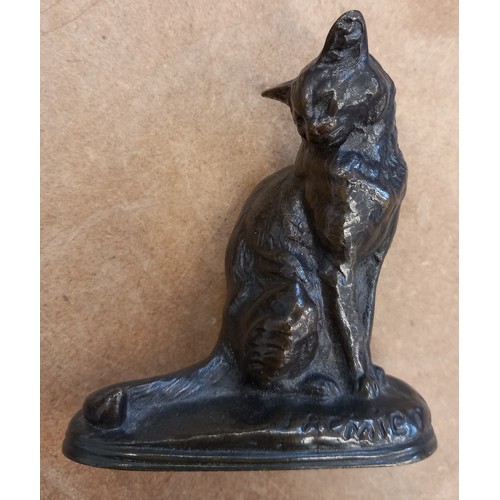 377 - Emmanuel Fremiet (French, 1824-1910), a patinated bronze model of a seated cat, signed in the cast, ... 