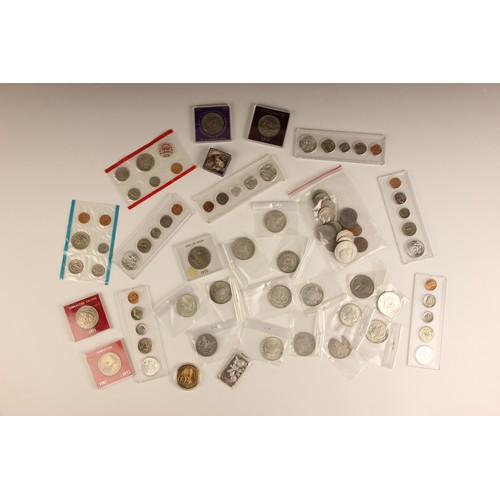 140 - A collection of English and USA coins to include Morgan dollars, trade dollars and USA commemorative... 