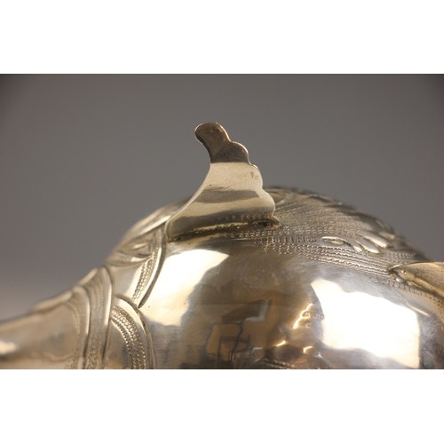 1 - A continental white metal novelty sauce boat, modelled as a fish with realistically engraved detail,... 