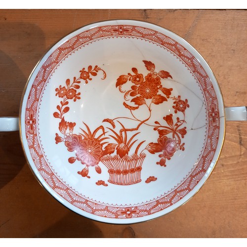 558A - A Royal Crown Derby part dinner service in the red ‘Aves’ pattern, comprising: four twin handled sou... 