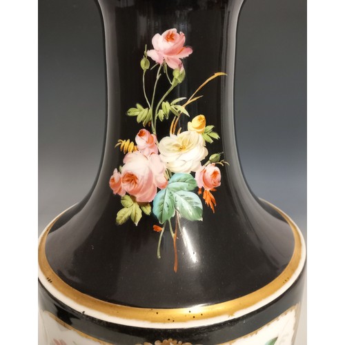 542 - A porcelain vase, late 19th century, the black glazed vase of urn form, painted with a portrait of a... 