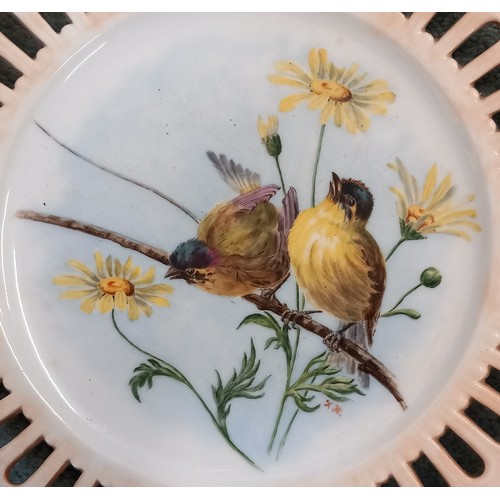 550 - Four cabinet plates, early 20th century, the wells painted over glaze with bird studies by Kate Edmu... 