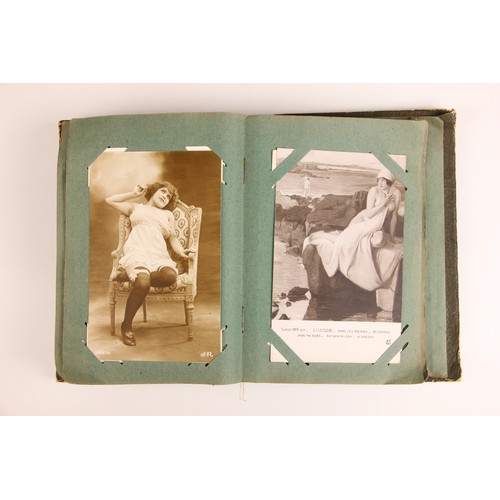 741 - A postcard album containing approximately ninety artistic and erotic postcards, to include examples ... 