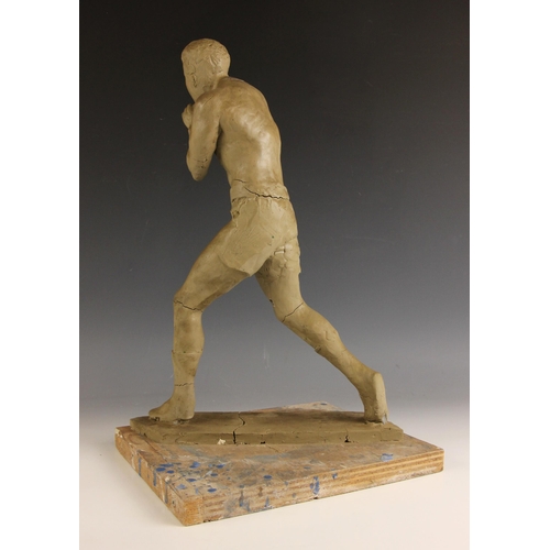 108 - John W Mills (1933-2023),   
Boxer #2,   
Composite clay on wooden base,   
49cm high overall (unfin... 