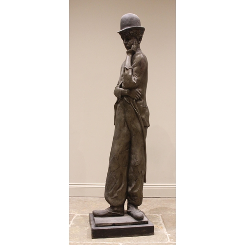 125 - John W Mills (1933-2023),   
Charlie Chaplin, masked,   
Patinated resin on stepped base,   
167cm h... 