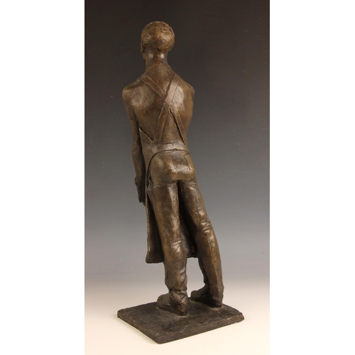 132 - John W Mills (1933-2023),  
Butcher with glove and apron,  
Patinated cold cast bronze on integral b... 