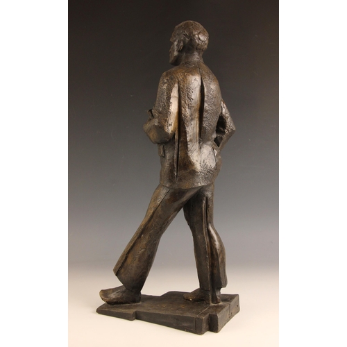 133 - John W Mills (1933-2023),  
Academic carrying books,  
Patinated cold cast bronze on integral base, ... 