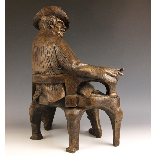 148 - John W Mills (1933-2023),  
'Thinking Man', 
Quentin Crisp seated with cigarette,  
Patinated cold c... 