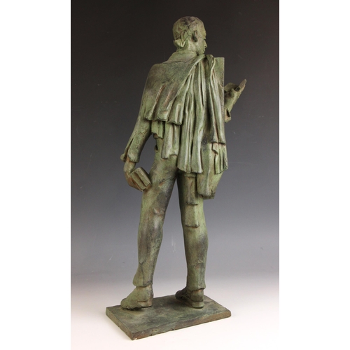 151 - John W Mills (1933-2023),  
Musician reading and holding books,  
Patinated resin on integral base, ... 