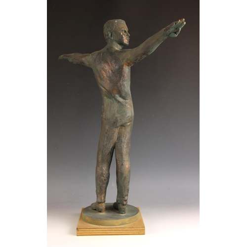 153 - John W Mills (1933-2023),  
Boy with arms outstretched,  
Patinated resin on wooden base,  
65cm hig... 