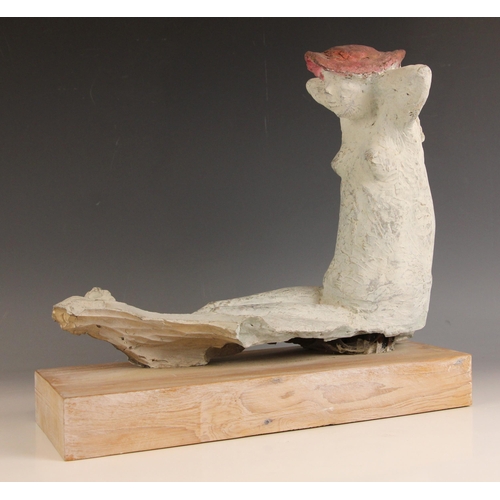 155 - John W Mills (1933-2023),  
Sunbather in red hat,  
Painted resin on wooden base,  
35cm high overal... 