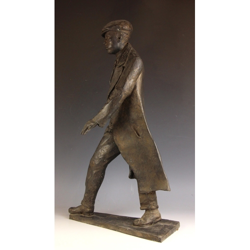 157 - John W Mills (1933-2023),  
William Mills,  
Man in flat cap striding,  
Black resin on integral bas... 