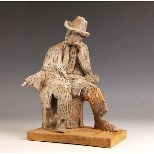 165 - John W Mills (1933-2023),  
'Thinking Man', 
Quentin Crisp seated with cigarette #2,  
Patinated col... 