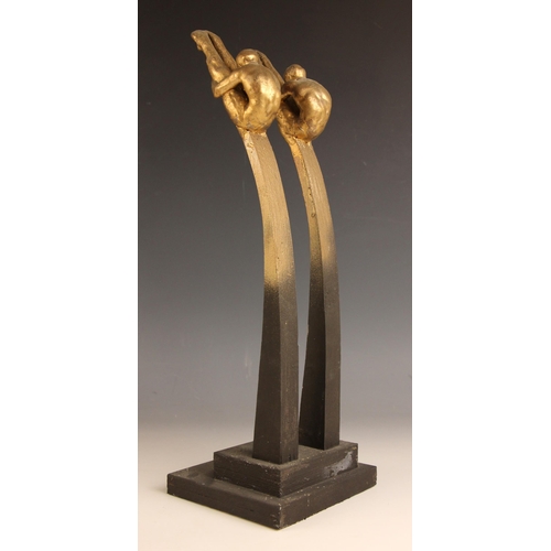 17 - John W Mills (1933-2023),   
Synchronised divers – pike,   
Painted resin on shaped and stepped wood... 