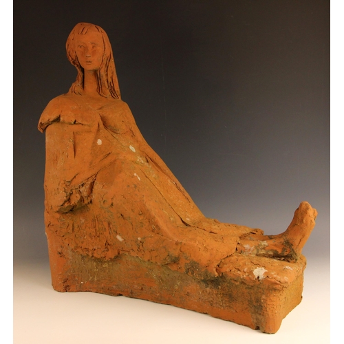 172 - John W Mills (1933-2023),  
Lady reclining on a bench,  
Terracotta, freestanding,  
61cm high overa... 