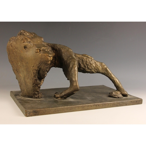 448 - John W Mills (1933-2023),   
Prowling lion looking back,   
Patinated bronze on rectangular base,   ... 