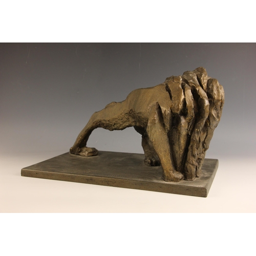 448 - John W Mills (1933-2023),   
Prowling lion looking back,   
Patinated bronze on rectangular base,   ... 