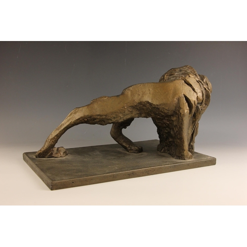 448 - John W Mills (1933-2023),   
Prowling lion looking back,   
Patinated bronze on rectangular base,   ... 