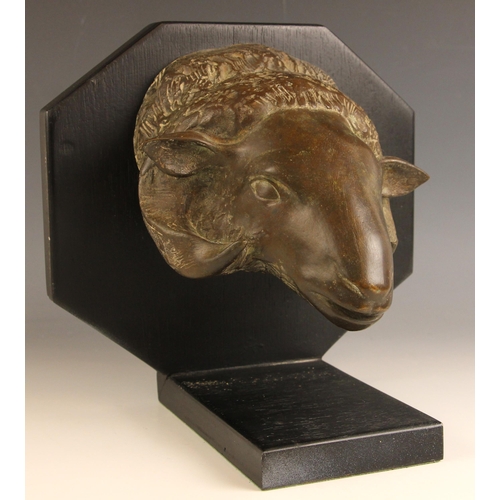 449 - John W Mills (1933-2023),   
Ram’s mask,   
Patinated bronze on octagonal shield base,   
27cm high ... 