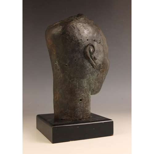 534 - Nigerian Ife head,  
Patinated bronze on ebonised stand,  
30cm high overall