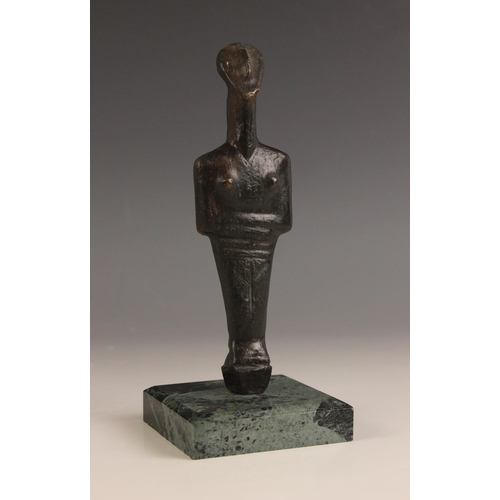 547 - A Cycladic type figural idol,  
Patinated bronze on marble base,  
20cm high overall