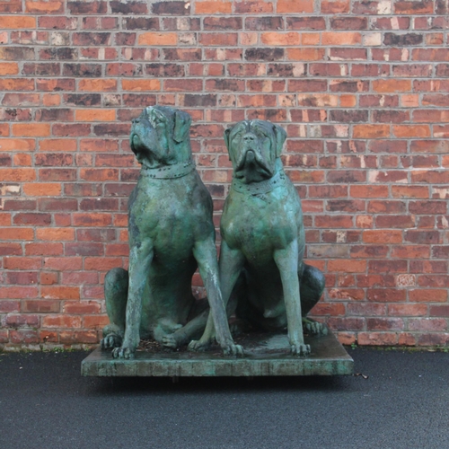 452A - John W Mills (1933-2023) 
Model of two bull mastiffs, 
Painted resin cast,
Each modelled seated, 
On... 