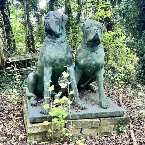 452A - John W Mills (1933-2023) 
Model of two bull mastiffs, 
Painted resin cast,
Each modelled seated, 
On... 