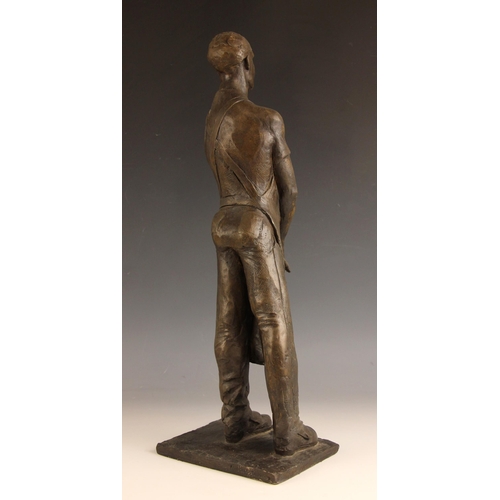 132 - John W Mills (1933-2023),  
Butcher with glove and apron,  
Patinated cold cast bronze on integral b... 