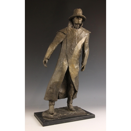 134 - John W Mills (1933-2023),  
Man in Sou'wester,  
Patinated cold cast bronze on ebonised base,  
62cm... 