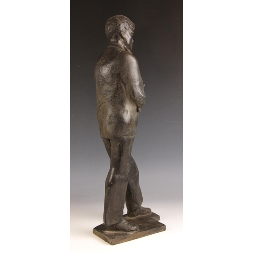 143 - John W Mills (1933-2023),  
Schoolboy carrying books,  
Patinated resin on integral base,  
50.5cm h... 