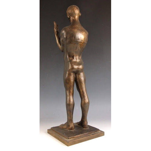 144 - John W Mills (1933-2023),  
Stylised male figure with hands raised,  
Patinated resin on integral st... 