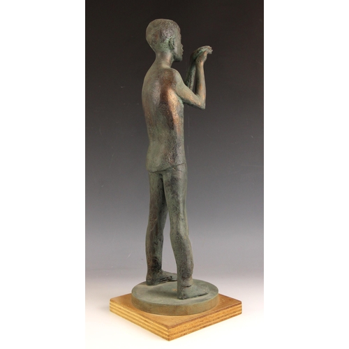 146 - John W Mills (1933-2023),  
Boy with raised hands together,  
Patinated resin on wooden base,  
53cm... 