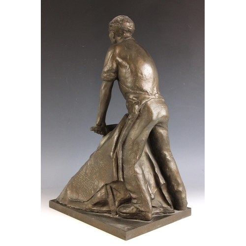 149 - John W Mills (1933-2023),  
Tanner at work,  
Patinated resin on rectangular base,  
50cm high overa... 