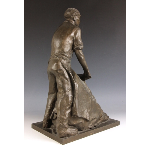 149 - John W Mills (1933-2023),  
Tanner at work,  
Patinated resin on rectangular base,  
50cm high overa... 