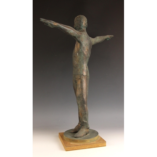 153 - John W Mills (1933-2023),  
Boy with arms outstretched,  
Patinated resin on wooden base,  
65cm hig... 