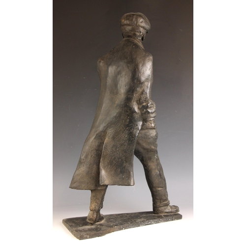 157 - John W Mills (1933-2023),  
William Mills,  
Man in flat cap striding,  
Black resin on integral bas... 