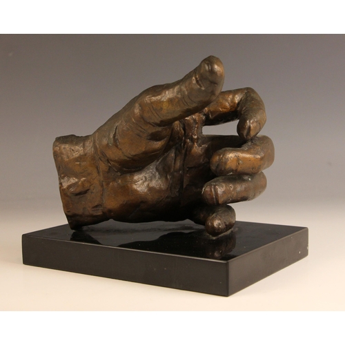 509 - Sir Jacob Epstein (British, 1880-1959),  
Cast of the artist's left hand,  
Patinated bronze on marb... 